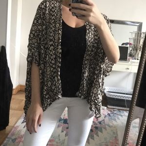Black and tan tribal patterned cardigan.